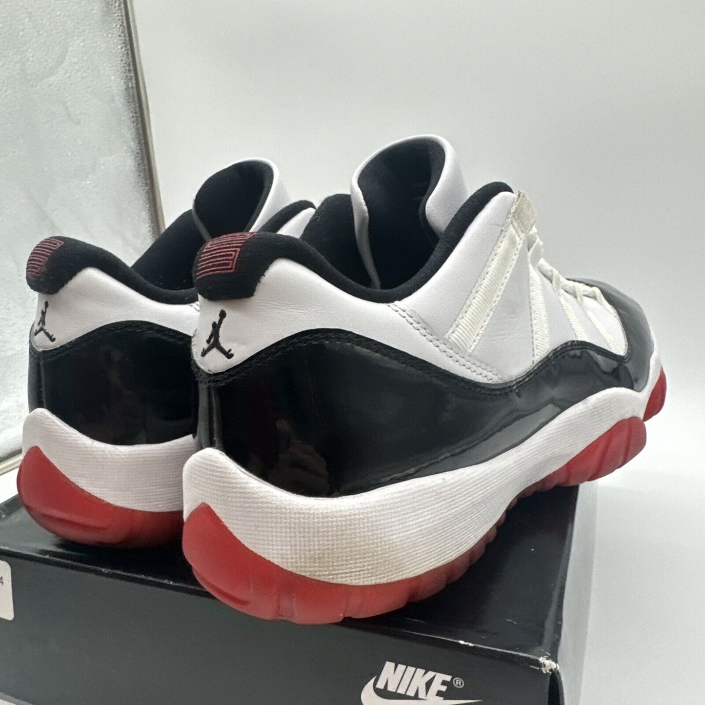 Size 11.5 - Jordan 11 Retro Low Concord-Bred White Black Red Soles Patent Leathe