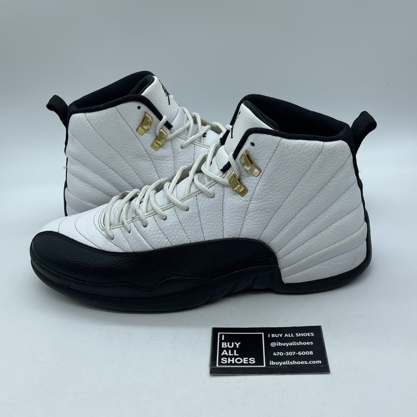 Size 11.5 - Jordan 12 Retro taxi release Black White Leather (130690-125)