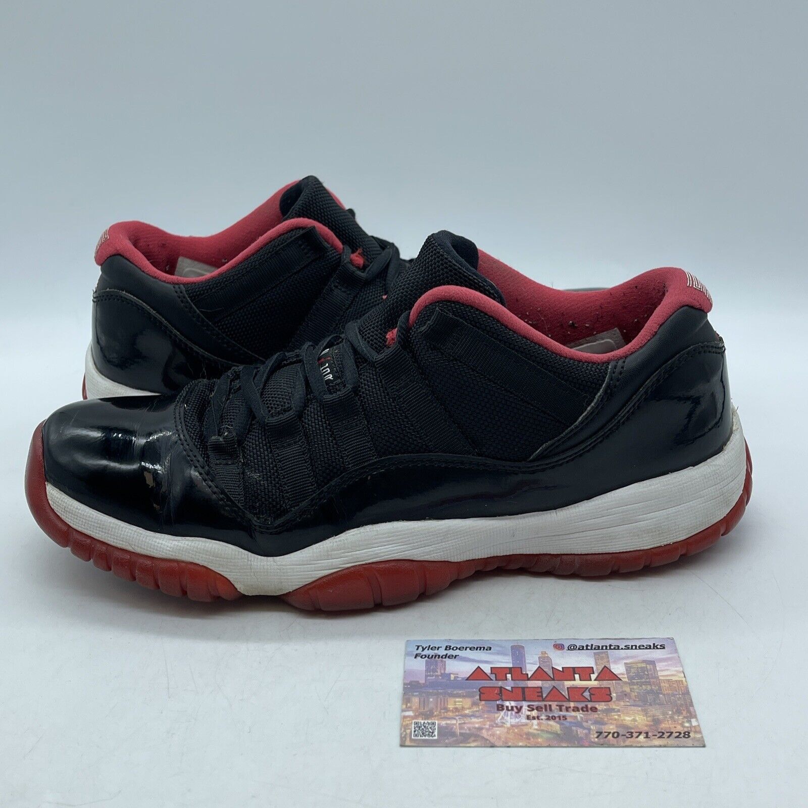 Size 7Y- Air Jordan 11 Retro 2015 Low Bred Black White Red Leather (528896-012)