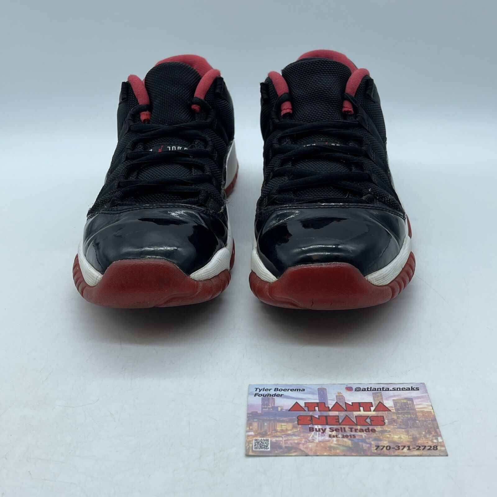 Size 7Y- Air Jordan 11 Retro 2015 Low Bred Black White Red Leather (528896-012)