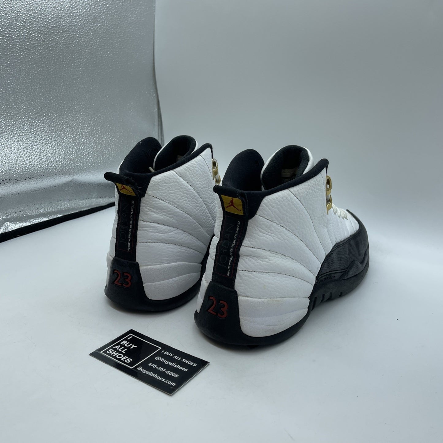 Size 11.5 - Jordan 12 Retro taxi release Black White Leather (130690-125)