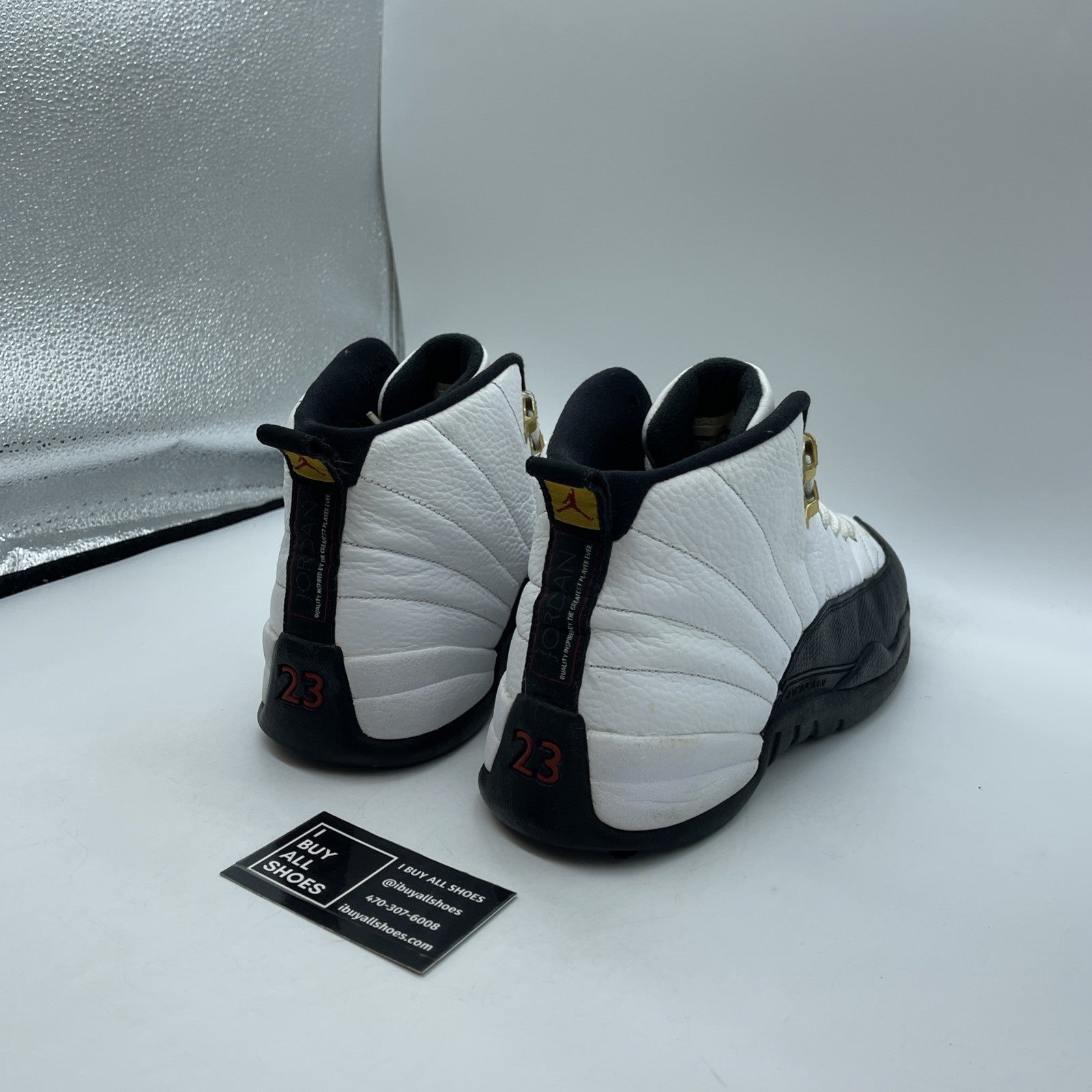 Size 11.5 - Jordan 12 Retro taxi release Black White Leather (130690-125)