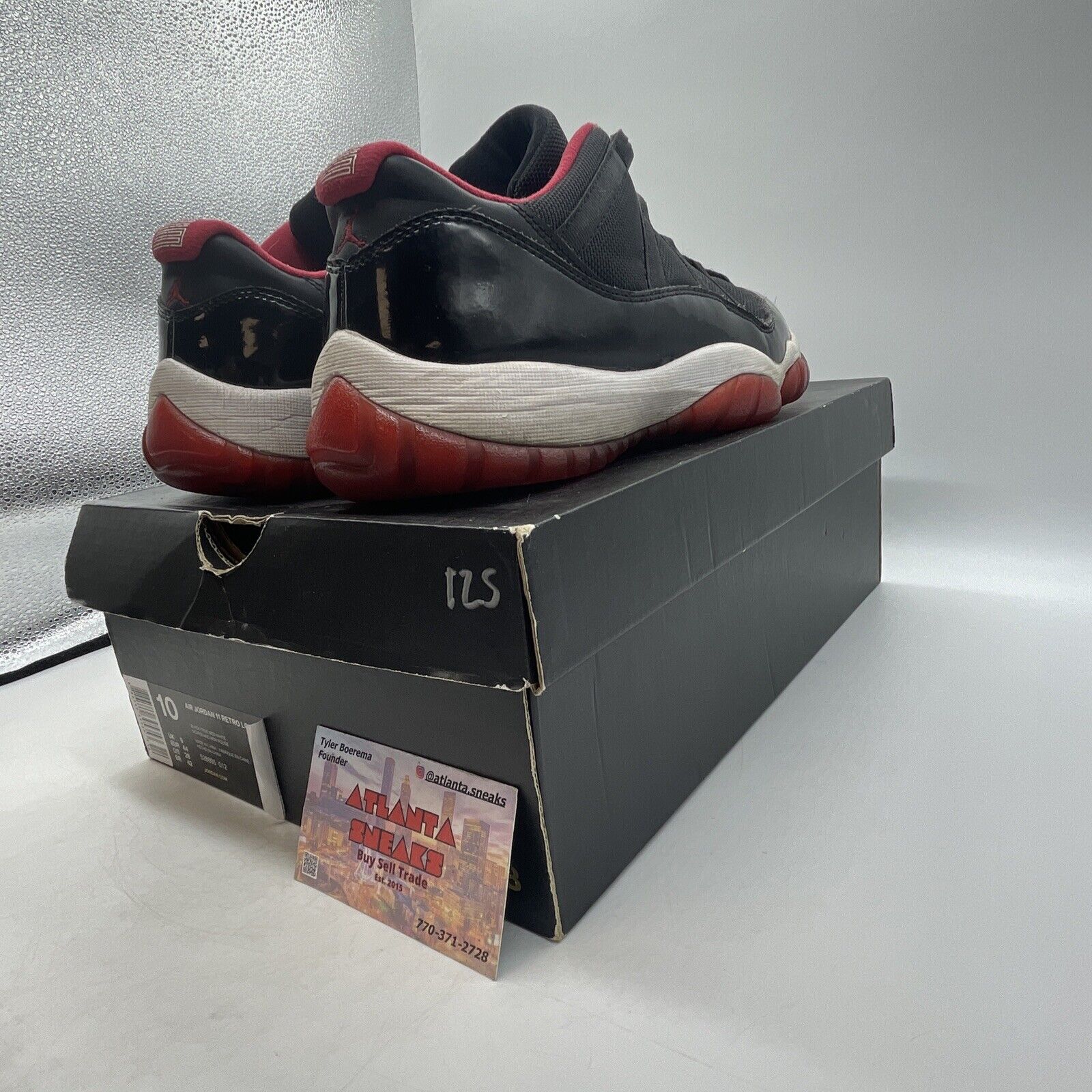 Size 10 - Air Jordan 11 Retro 2015 Low Bred Black White Red  (528895-012)