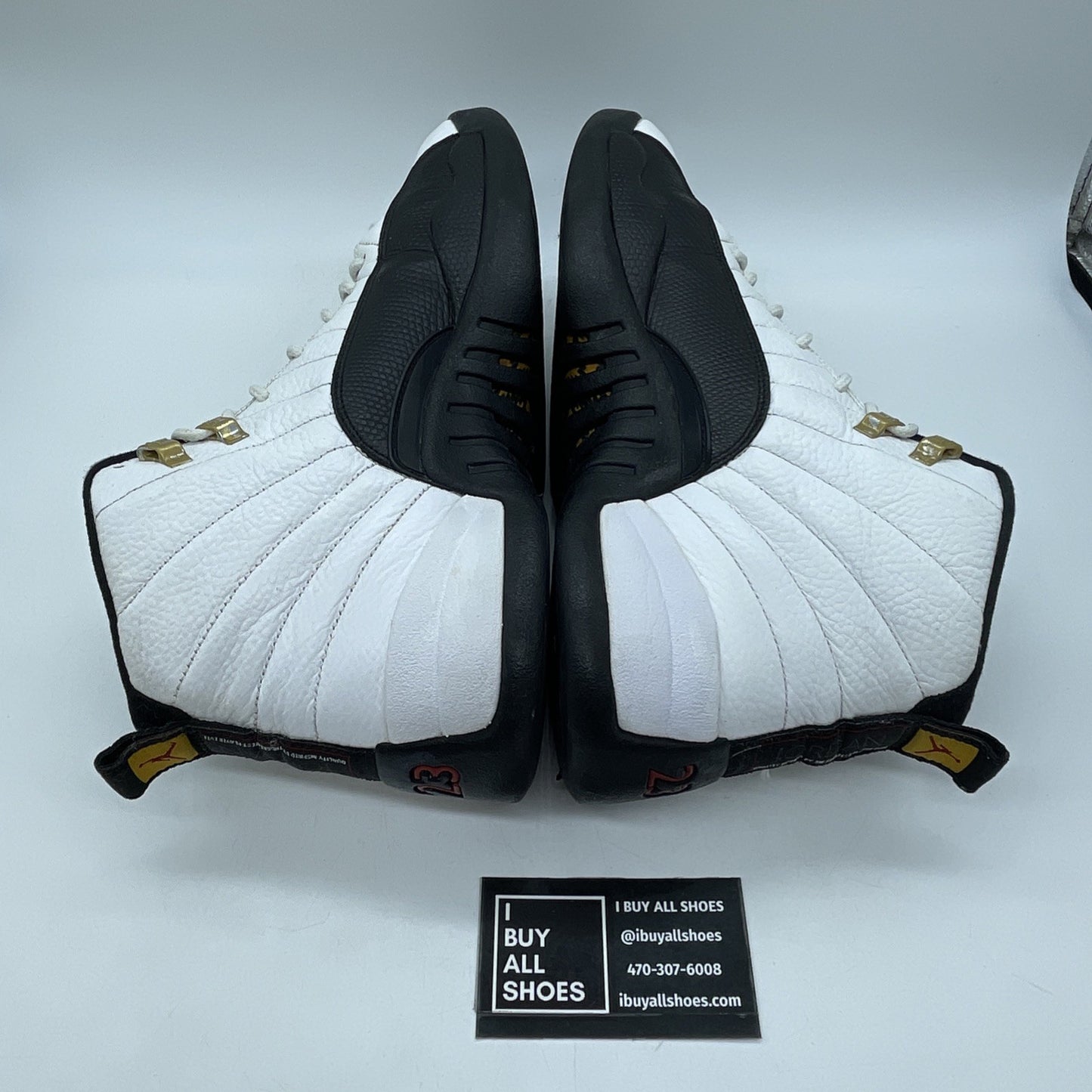 Size 11.5 - Jordan 12 Retro taxi release Black White Leather (130690-125)