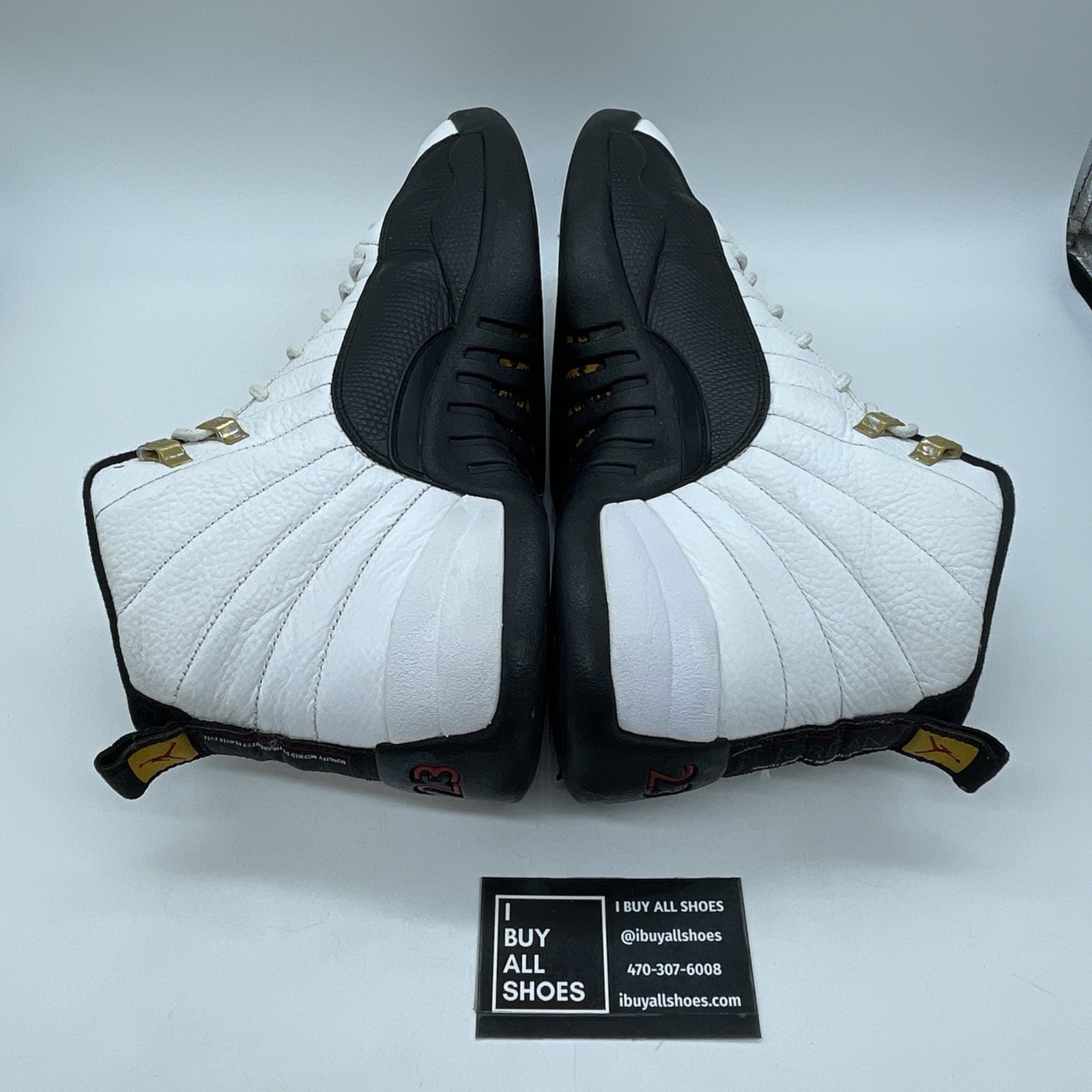 Size 11.5 - Jordan 12 Retro taxi release Black White Leather (130690-125)
